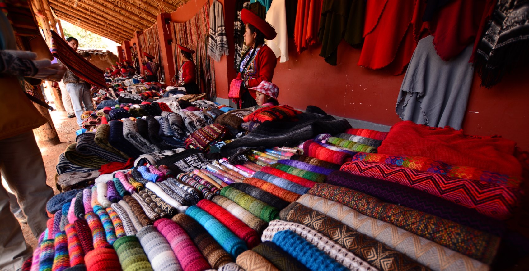 Traditional Peruvian textiles displayed at a market